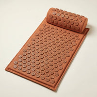 Acupressure mat and pillow set in terracotta