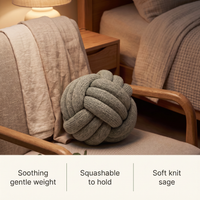 Weighted knot pillow features: soothing gentle weight, squashable to hold, soft knit sage