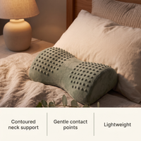 Acupressure neck pillow features: contoured neck support, gentle contact points, lightweight